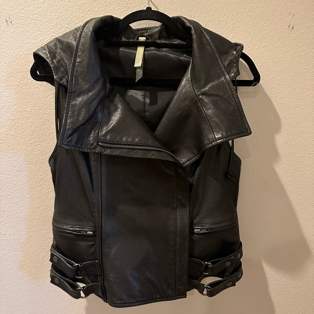 Geniune leather vest. Removable hood. Great details!